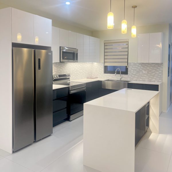 Modern Kitchen with waterfall countertops